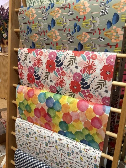 Patterned gift wrap rolls on display at Paper Trails of Rocky River