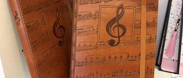 Leather journals embossed with sheet music Leather journals embossed with sheet music at Paper Trails
